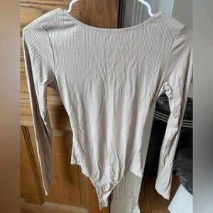 Elegant Beige Ribbed Long Sleeve Bodysuit
